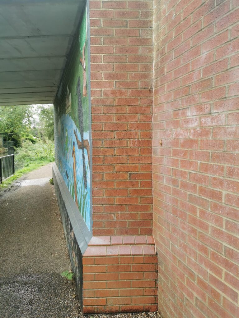 Before and after image of graffitti ha